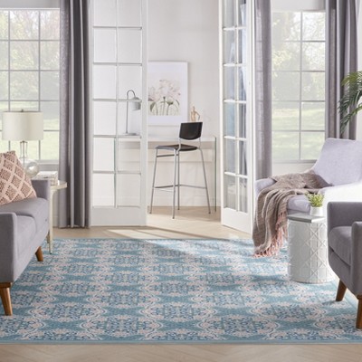 Handmade Blue Floral Rectangular 6' x 9' Stain-Resistant Synthetic Rug
