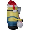 Gemmy Christmas Airblown Inflatable Minions Carrying Candy Cane Scene Universal, 4 ft Tall - 3 of 4