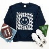 Simply Sage Market Women's Graphic Sweatshirt Football Smiley Face - 3 of 4