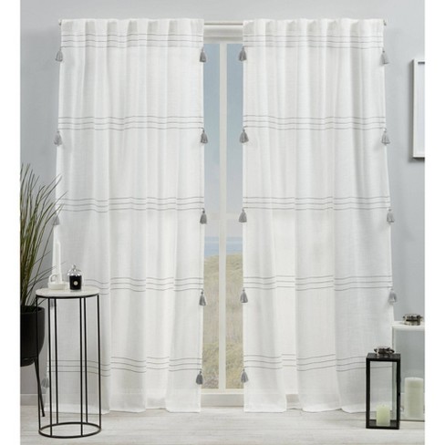 Demi Light Filtering Curtain Panel with Tassels - Exclusive Home - image 1 of 4