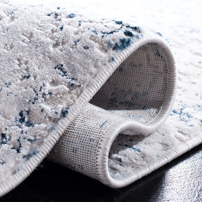 Cream and Navy Abstract Wool Synthetic Area Rug, 3' x 5'