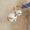 Storied Home Large Metal Bell Ornament with Star Cut-Outs in Distressed Finish, White - 3 of 3