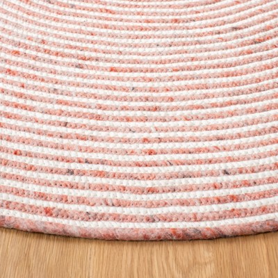 Red and Ivory Oval Braided Wool 4' x 6' Area Rug