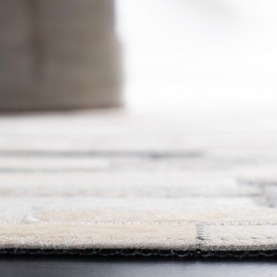 Ivory Geometric Hand-Knotted Cowhide Area Rug - 3' x 5'