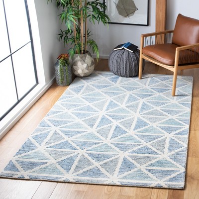 Hand-Tufted Blue and Ivory Wool Abstract Area Rug, 4' x 6'