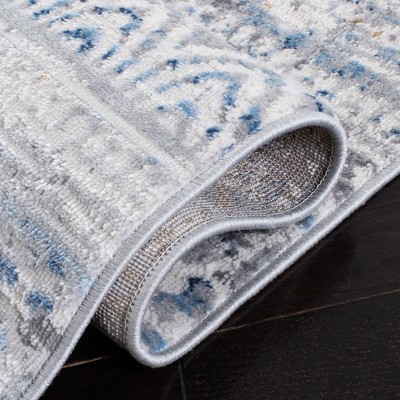 Ivory and Blue Reversible Flat Woven 8' x 10' Synthetic Rug