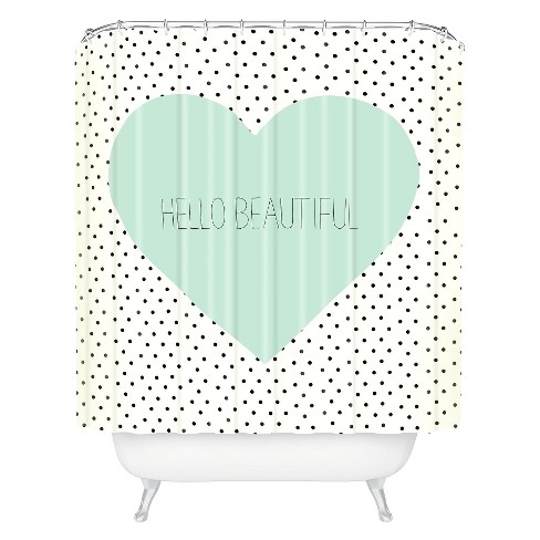 mint green shower curtain and rugs