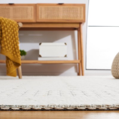 Ivory and Green Handwoven Wool 6' x 9' Area Rug