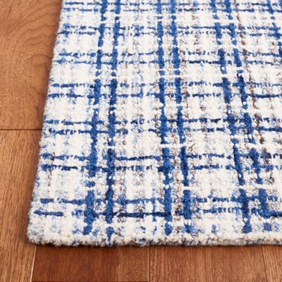 Handmade Blue and Ivory Wool Tufted Rectangular Area Rug, 4' x 6'