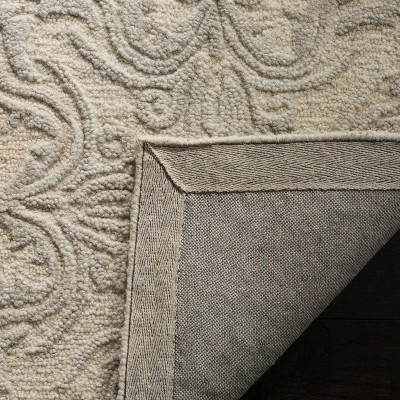 Ivory Floral Tufted Wool-Cotton Blend 8' x 10' Area Rug