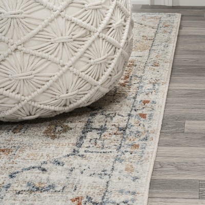 Cream and Terra Synthetic Medallion Washable Area Rug