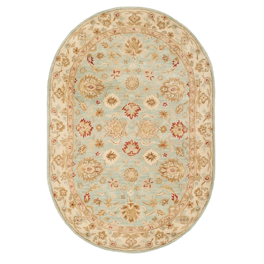 4'6inx6'6in Oval Georgeta Tufted Area Rug Beige/Blue - Safavieh