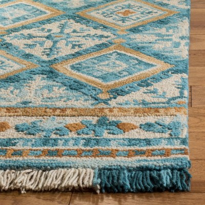 Handmade Ivory and Teal Wool Rectangular Area Rug, 5' x 8'