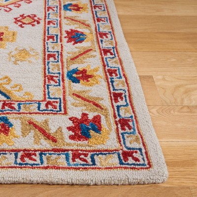 Handmade Ivory Wool Square Tufted Area Rug - 5' x 8'