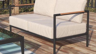 Beige Cushioned Loveseat with Black Steel Frame and Teak Accents