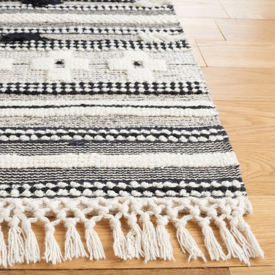 Handmade Black and Ivory Wool Flat Woven Area Rug