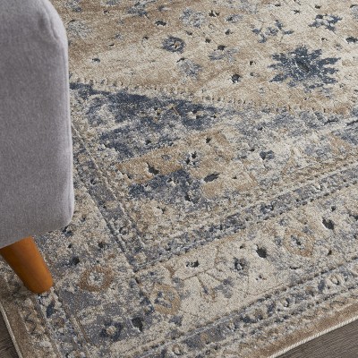 Ivory and Blue Geometric Floral Synthetic Area Rug