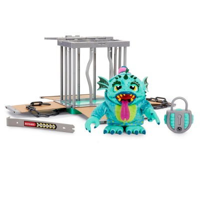 caged monster toy