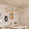 BAOURE 26in Modern Gold 5 Light Sputnik Chandelier with Clear Glass Shades, Mid-Century Hanging Pendant Light for Dining Room - 3 of 4