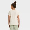 Girls' Bluey Floral Glitter Short Sleeve Graphic T-Shirt - Ivory - 3 of 4