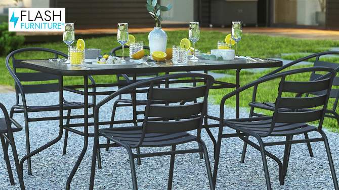 Flash Furniture 7 Piece Outdoor Patio Dining Set - 55" Tempered Glass Patio Table with Umbrella Hole, 6 Black Metal Aluminum Slat Stack Chairs, 2 of 12, play video