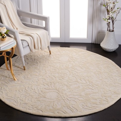 Ivory Hand-Knotted Round Wool and Synthetic Rug