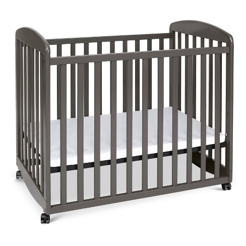 Davinci Alpha Mini Rocking Crib In White Bed Bath Beyond