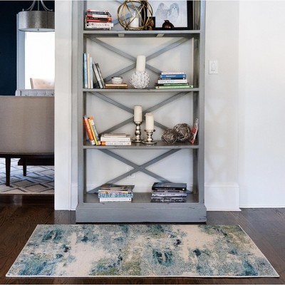 Luminous Light Blue Abstract Synthetic Indoor Rug, 10' 6" x 16' 5"