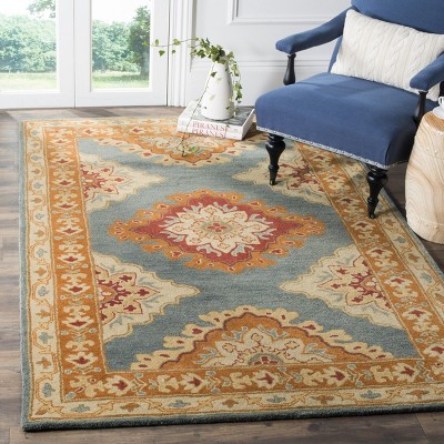 Hand-Tufted Blue and Rust Wool 5' x 8' Area Rug