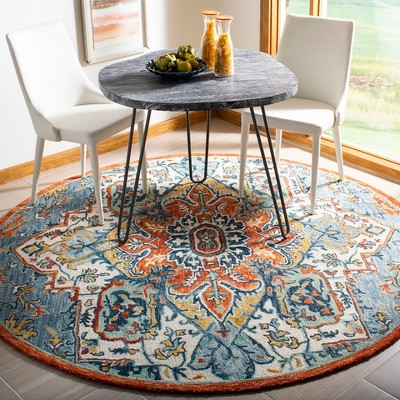 Blue and Rust Round Tufted Wool Floral Rug