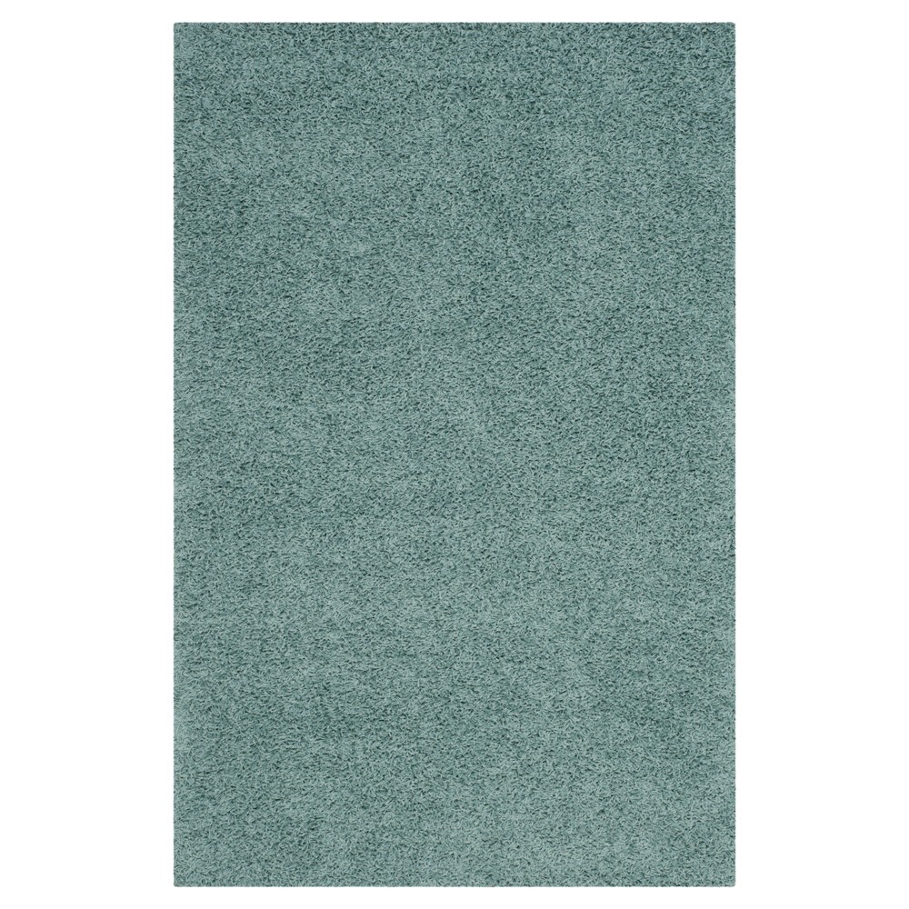 6'x9' Reedley Solid Loomed Area Rug Seafoam - Safavieh