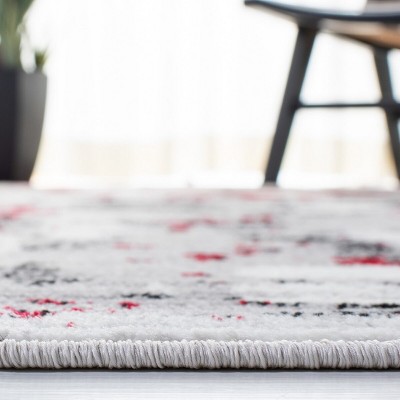 Skyler Grey and Red Synthetic Medallion Area Rug