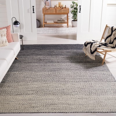 Handmade Natural and Black Jute Area Rug, 6' x 9'