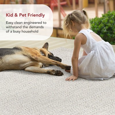 Handmade Ivory Braided 4' x 6' Oval Synthetic Area Rug