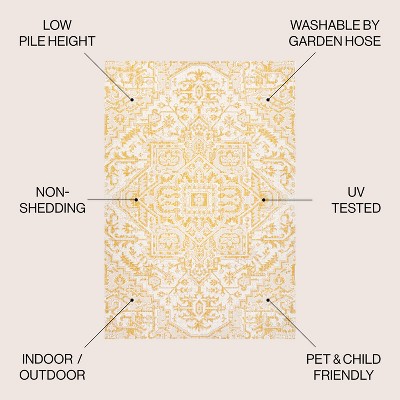 4' x 6' Cream and Yellow Synthetic Bohemian Medallion Area Rug