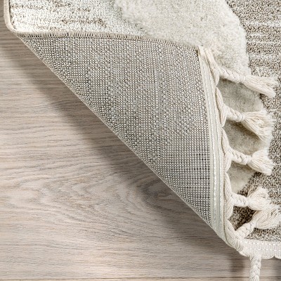 Ivory and Beige Abstract High-Low Tasseled 6'7" x 9' Area Rug