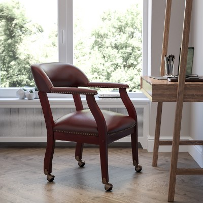 Elegant Oxblood Vinyl Conference Chair with Brass Nail Trim