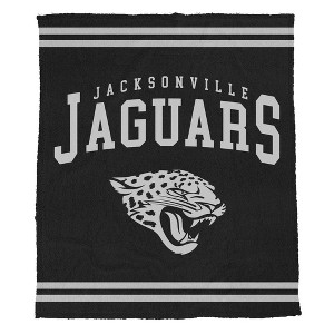 NFL Jacksonville Jaguars Midnight Logo Cozy Knit Blanket - 1 of 2