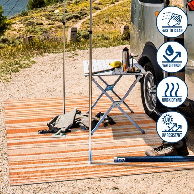 Castara Chic Orange & Cream Striped Synthetic 5x8 Area Rug