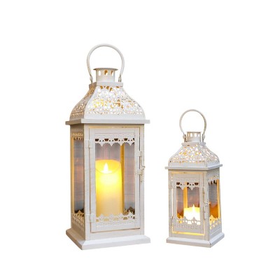 HomeRoots Set of Two Cream Distressed Filigree Metal Tabletop Lantern Candle Holders