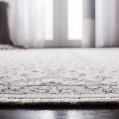 Elegant Gray 4' x 6' Synthetic Rectangular Easy-Care Area Rug