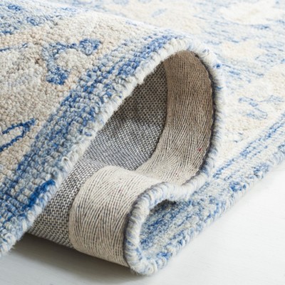 Ivory and Blue Handmade Wool Medallion Area Rug