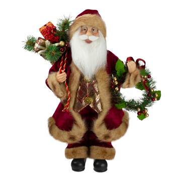 Northlight 18" Red Santa Claus Holding a Wreath and Gift Bag Christmas Figurine