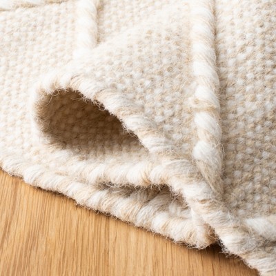 Beige and Ivory Handmade Wool Tufted Shag Rug, 4' x 6'