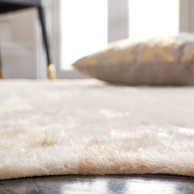 Beige and Gold Faux Cowhide 6' x 8' Area Rug