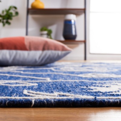 Navy and Ivory Synthetic Flat Woven 6' x 9' Area Rug