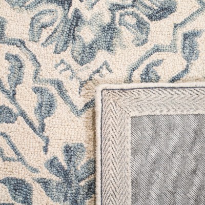 Hand-Tufted Blue Ivory Wool Splash Area Rug 27" x 8"