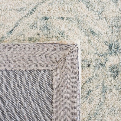 Handmade Light Blue Wool and Synthetic Tufted Rug
