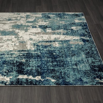 Light Blue Abstract 5' x 7' Stain-Resistant Area Rug