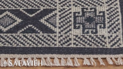 Handmade Black and Ivory Wool Flat Weave Area Rug, 4' x 6'